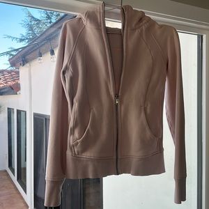 Lululemon zip hoody in pale pink.
